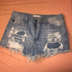 Distressed denim shorts